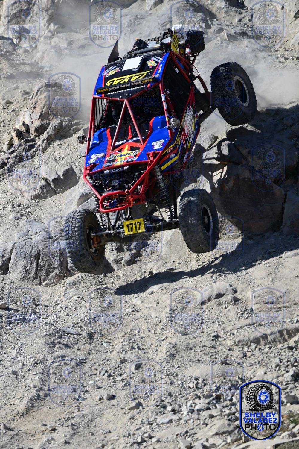 Rock crawler number 1717 climbing a steep boulder field